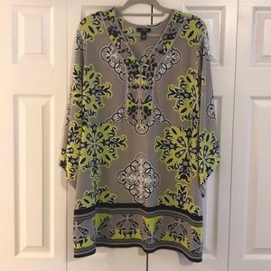 Tunic with encrusted neckline